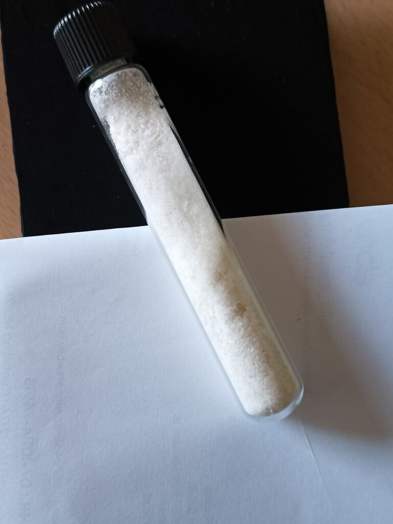 Representative photograph of 8-Hydroxyquinoline sample (CAS 148-24-3)
